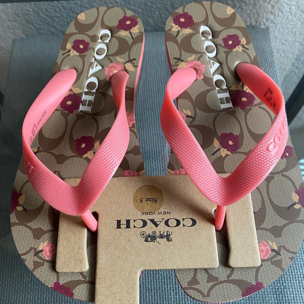 NWT Coach signature flip flops. Floral pattern.